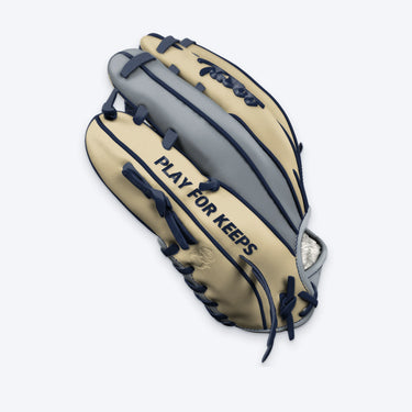 Pinky side of the Tater Double Post outfield glove with PLAY FOR KEEPS lettering and Tater script logo
