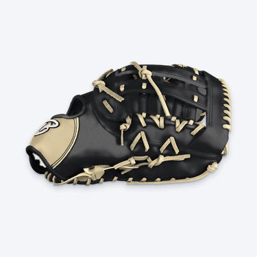 Thumb side of the Tater first base mitt with the blonde wrist pad, TB logo and laced Pro-H web