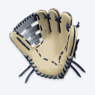 Palm view of the Tater Double Post outfield glove showing the blonde pocket, navy lacing and embossed Tater logo