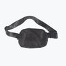 The image displays a black crossbody fanny pack with the "Tater" brand prominently embossed on the front. The strap bears a repeated slogan or message that appears to be part of the brand's design, enhancing the product's athletic appeal. The bag's compact size suggests functionality and convenience for carrying essentials, catering to an active lifestyle. 