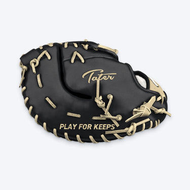 Pinky side of the Tater first base mitt showing the blonde embroidered Tater script logo, PLAY FOR KEEPS lettering and blonde laces