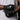Black baseball batting gloves with white logo and 'PLAY FOR KEEPS' wrist text, worn by player